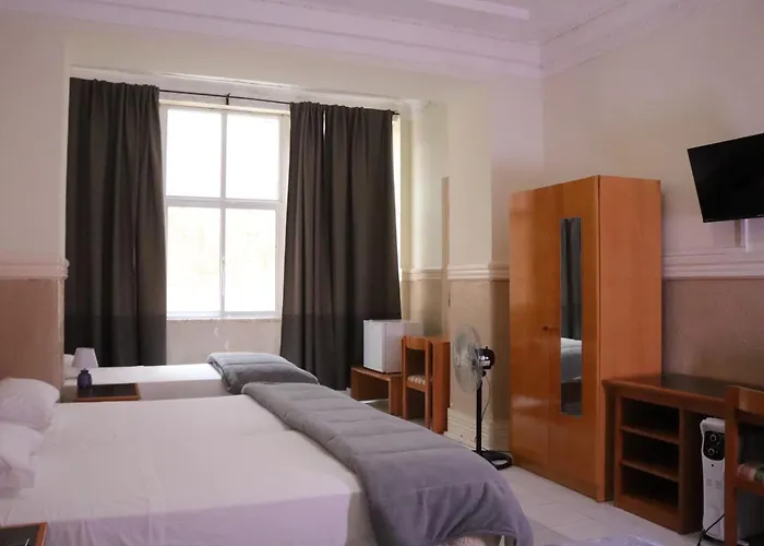 Midis - Local Pensión Lisboa